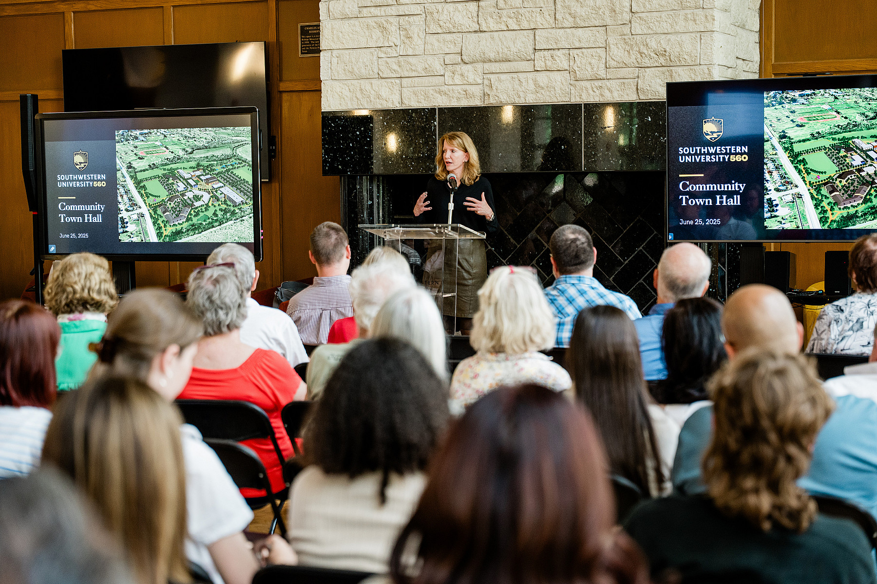 President Laura Trombley addresses community members at June 25, 2025 Town Hall.